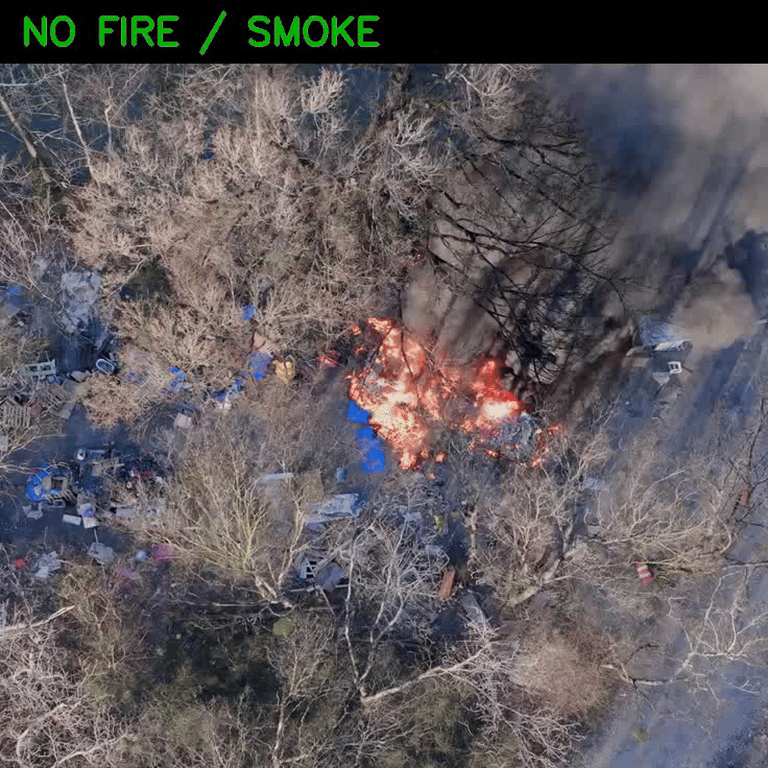 DLStreamer expected output showing a fire and smoke alert banner across the top of an aerial wildfire video
