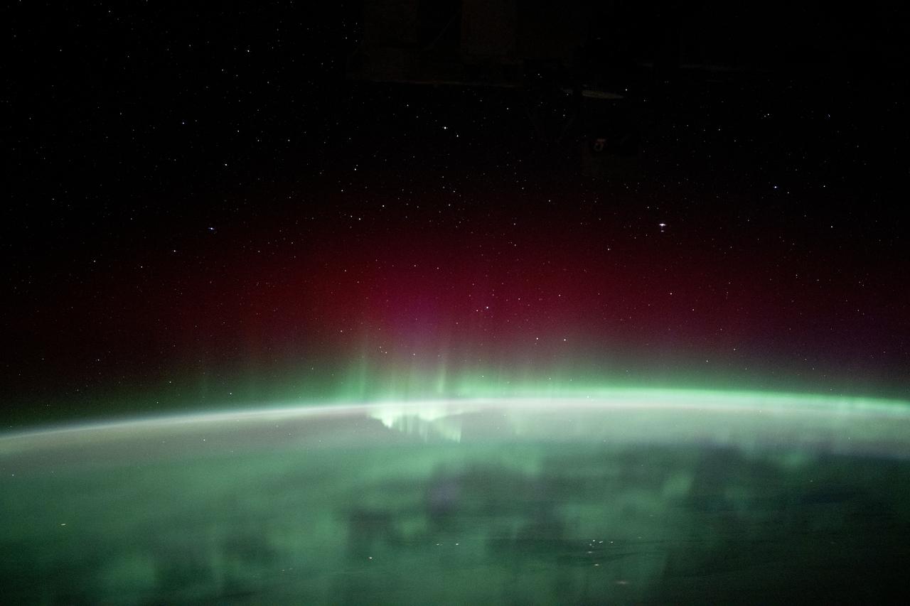 Aurora borealis blankets the Earth, seen from the ISS