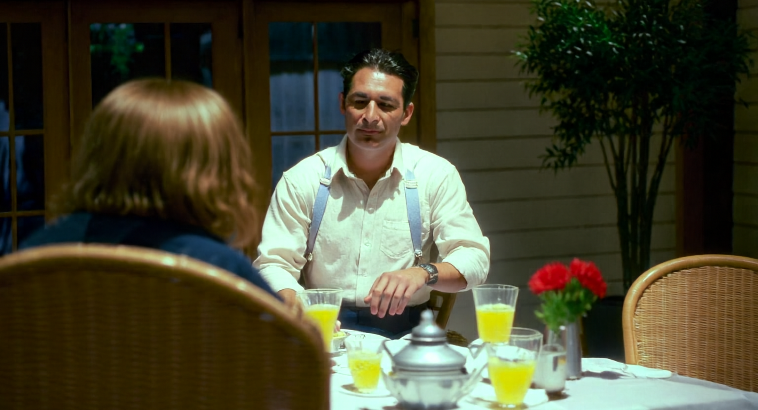 Two people at an outdoor table